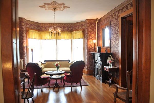 Comfortable living room with fireplace at Maplecroft